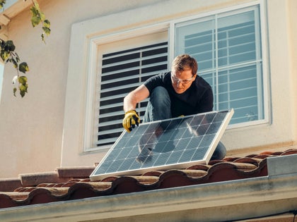 Solar panel on a roof being installed