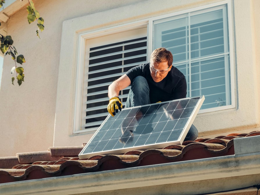 Solar panel on a roof being installed