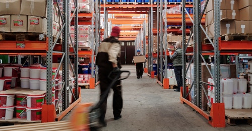 A worker in a warehouse