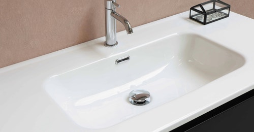 A bathroom sink representing greywater
