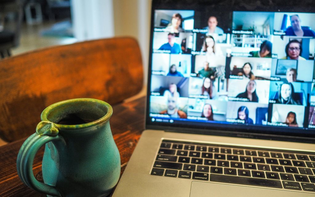 A laptop with a zoom meeting on it