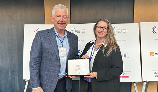 Dean Bulloch (left), vice president, Human Resources and Corporate Services, and Michelle Chrétien (right), associate vice president, Research & Innovation, accept CICan's 2023 silver Award of Excellence in Applied Research and Innovation.