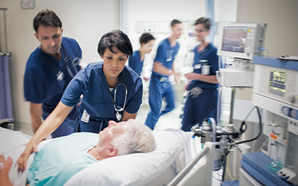 Female nurse helping patient