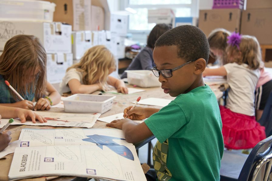 A boy in a classroom