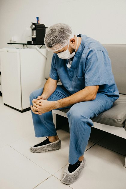 A nurse sitting down