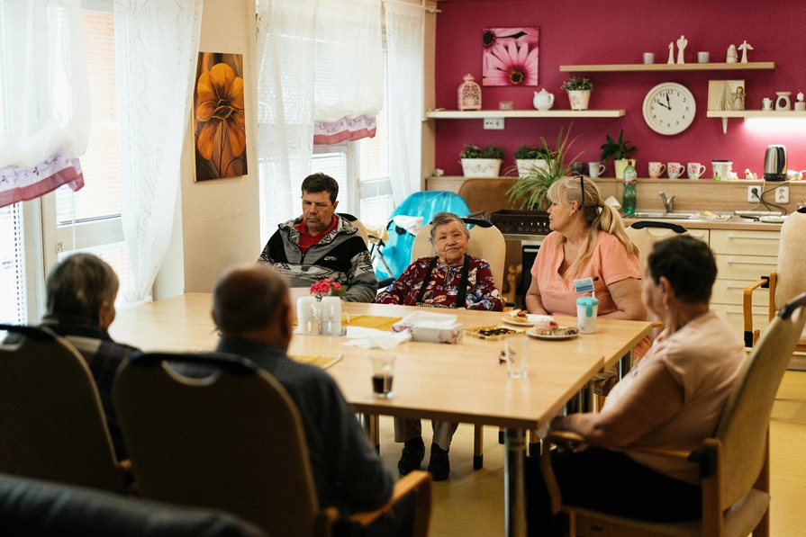 Seniors sitting at a table together