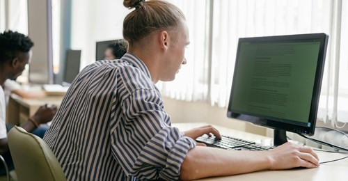 Person sitting at a computer