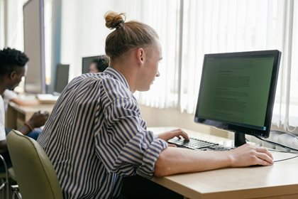 Person sitting at a computer