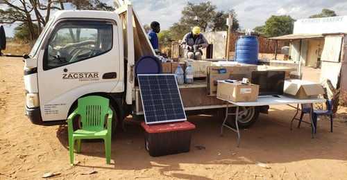 A solar panel against a truck 