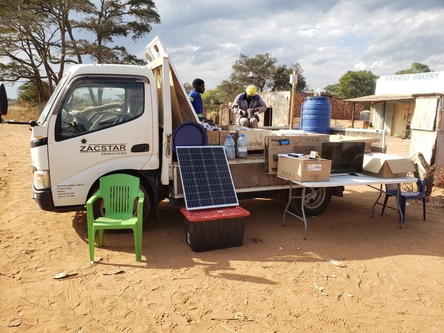 A solar panel against a truck 